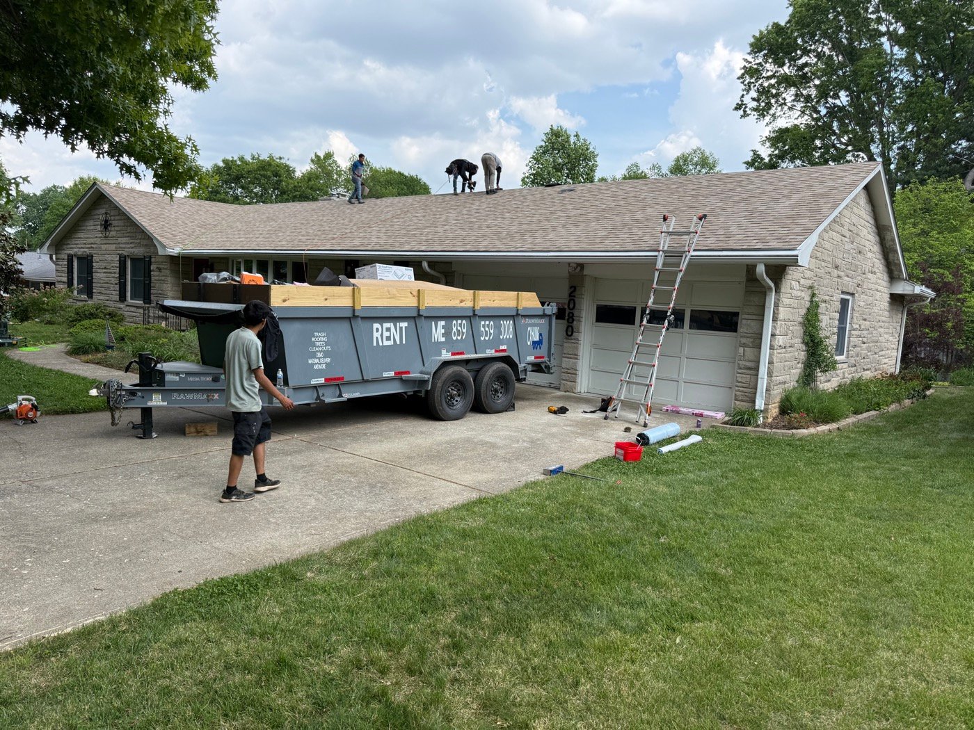 Roof replacement on a stone ranch home