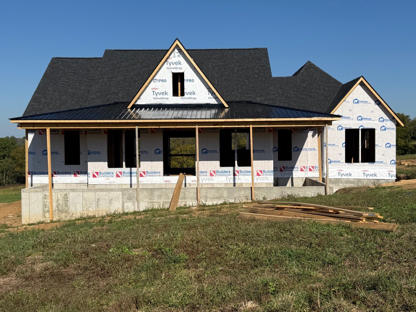 Custom home build with metal porch roof